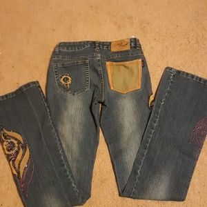 Size 1 designed in the USA dark blue Jeans.